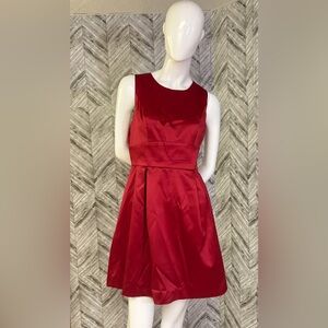 Womens Black Collection red “satin” style dress, knee length medium sleeveless